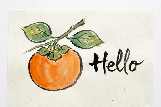 Etegami Painting — A hand-painted persimmon fruit with a handwritten message "Hello"., kết quả Gemini.